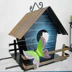 Casita de pájaros con pie de amigo